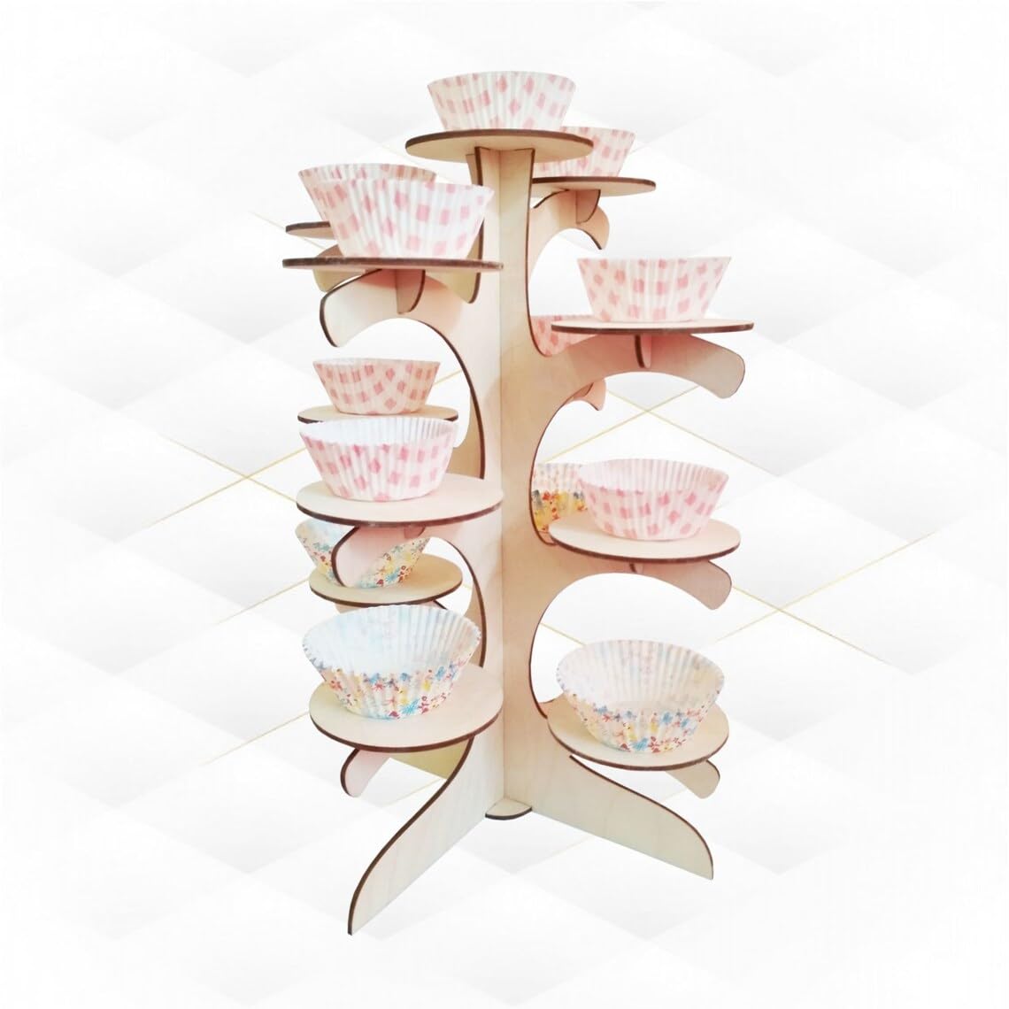 Wooden cupcake stand with colorful cupcake liners on a white background