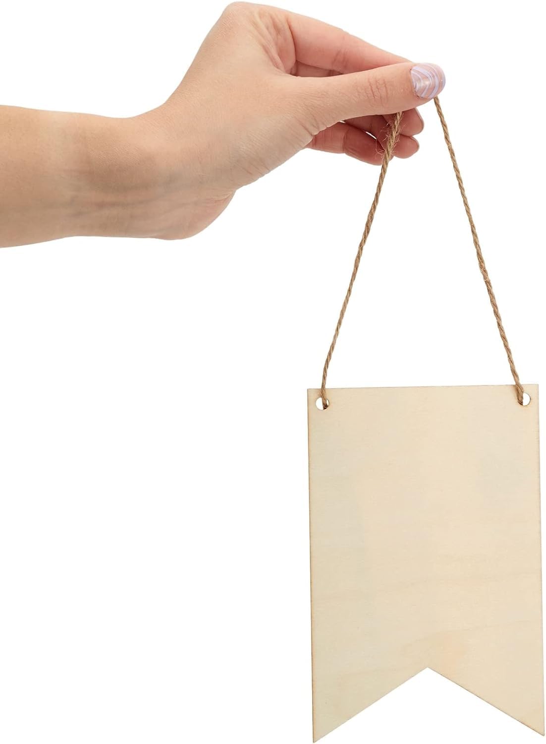 Hand holding a beige paper flag with twine on a white background