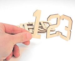 Wooden letters and numbers on a white background