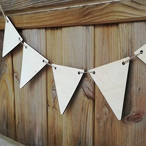 White triangle-shaped bunting flags hanging against a wooden background