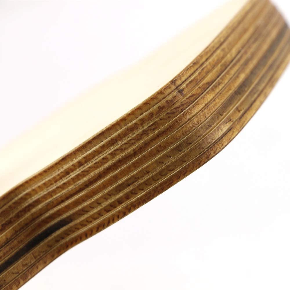 Close-up of a wooden belt on a white background