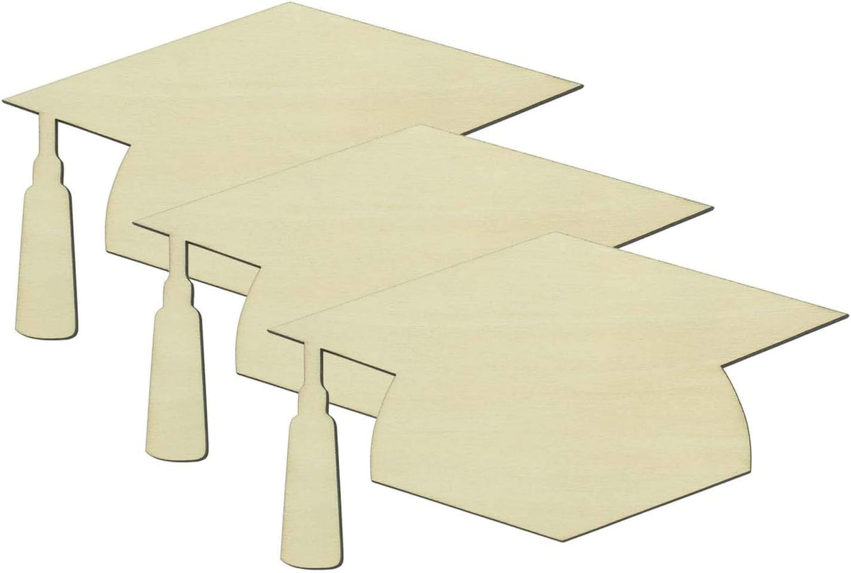 Three beige graduation caps with tassels on a white background