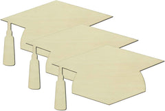 Three beige graduation caps with tassels on a white background