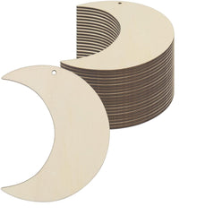 Stack of crescent-shaped wooden cutouts on a white background