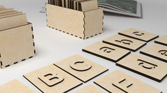 Wooden puzzle pieces with numbers and letters on a white surface