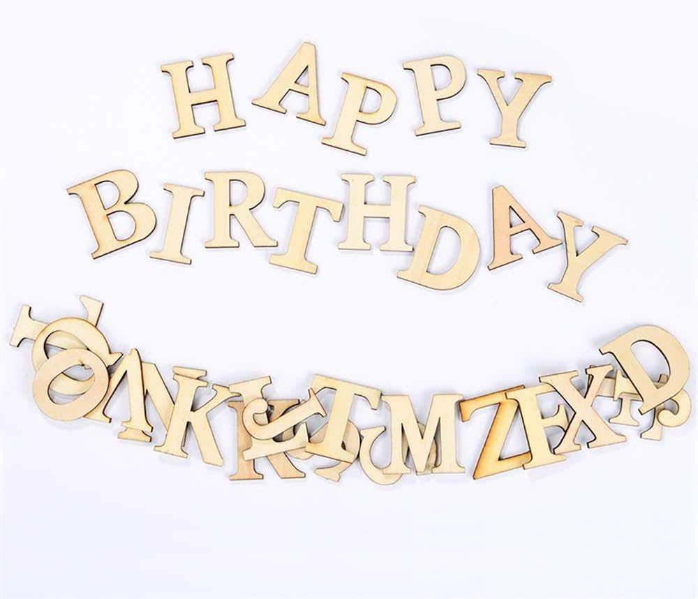 Wooden 'Happy Birthday' and alphabet letters on a white background