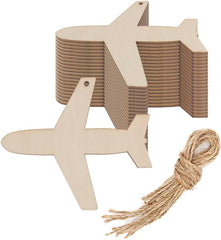 Stack of cardboard airplane shapes with twine on a white background