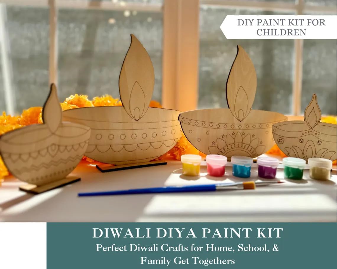 DIWali Diya paint kit with wooden diyas, paint, and brushes on a table.