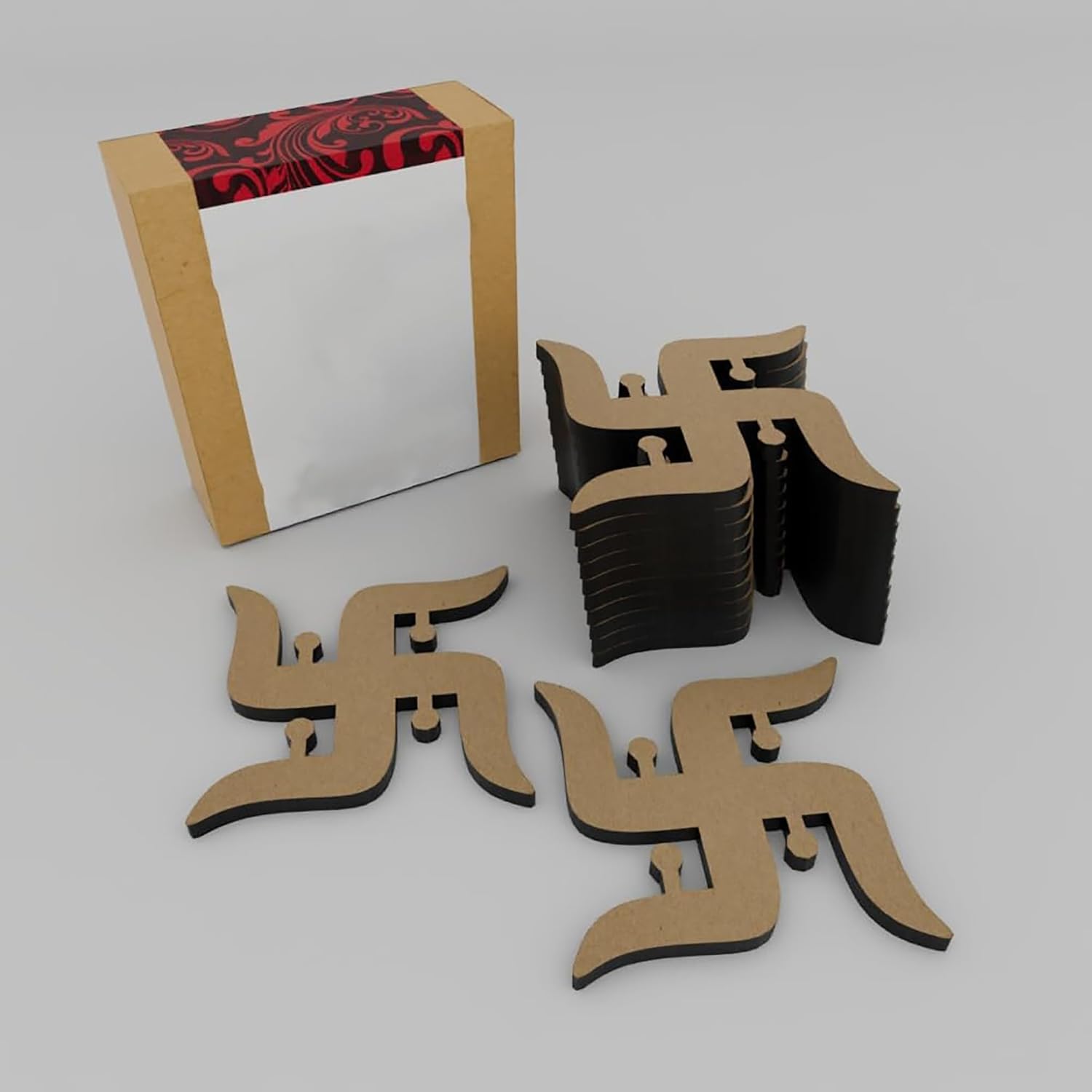 Cardboard swastika symbols with a box on a gray background