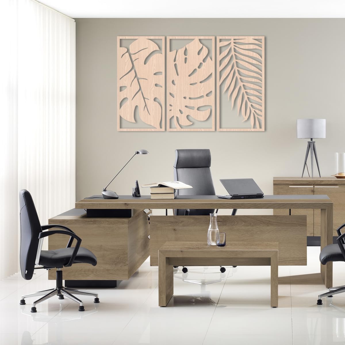 Modern office setup with a large wooden desk, chairs, and decorative wall art.