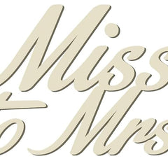 Wooden cutout letters spelling 'Miss' and 'Mrs.' on a white background