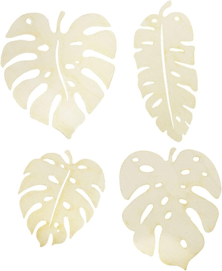 Four beige tropical leaf coasters on a white background