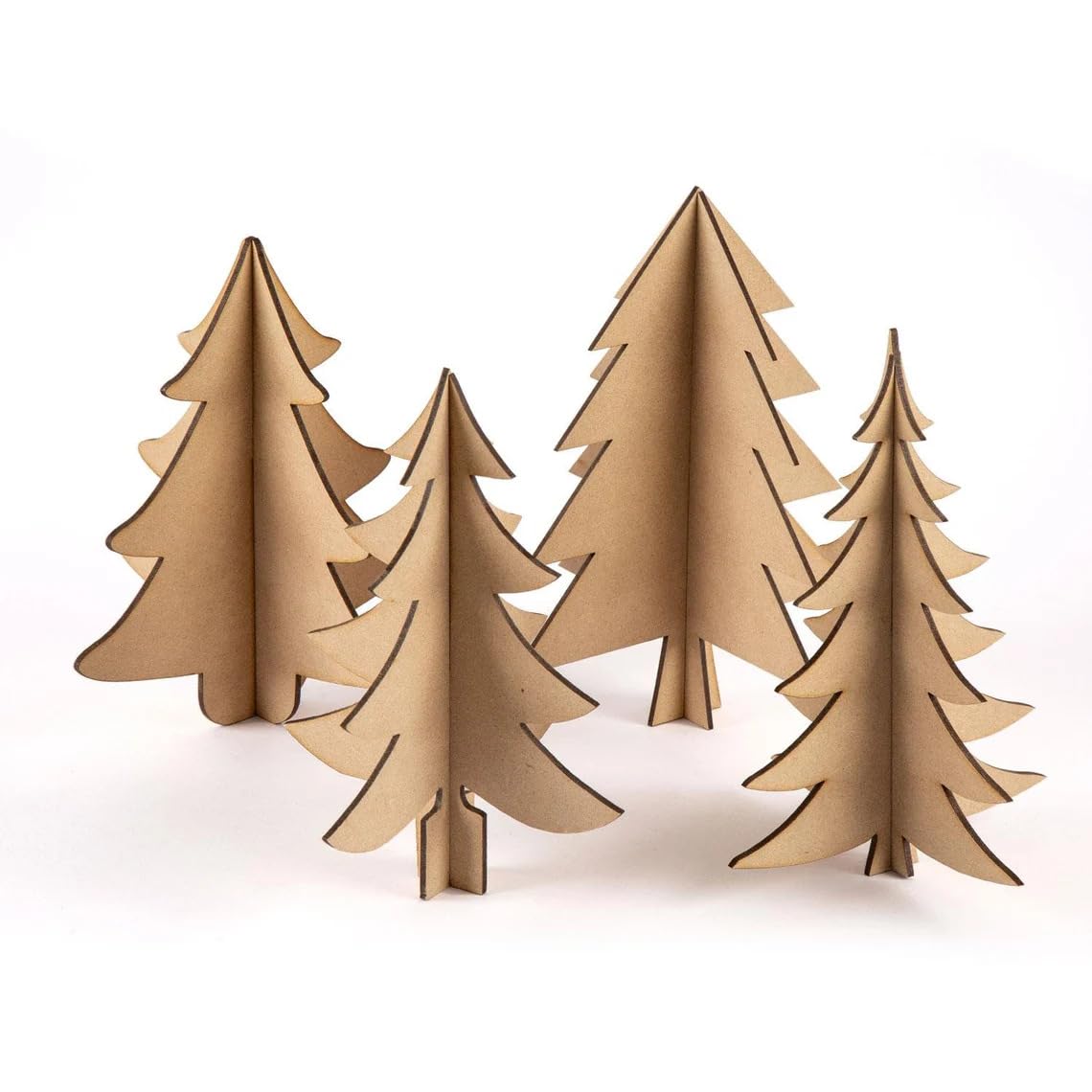 Set of four cardboard Christmas trees on a white background