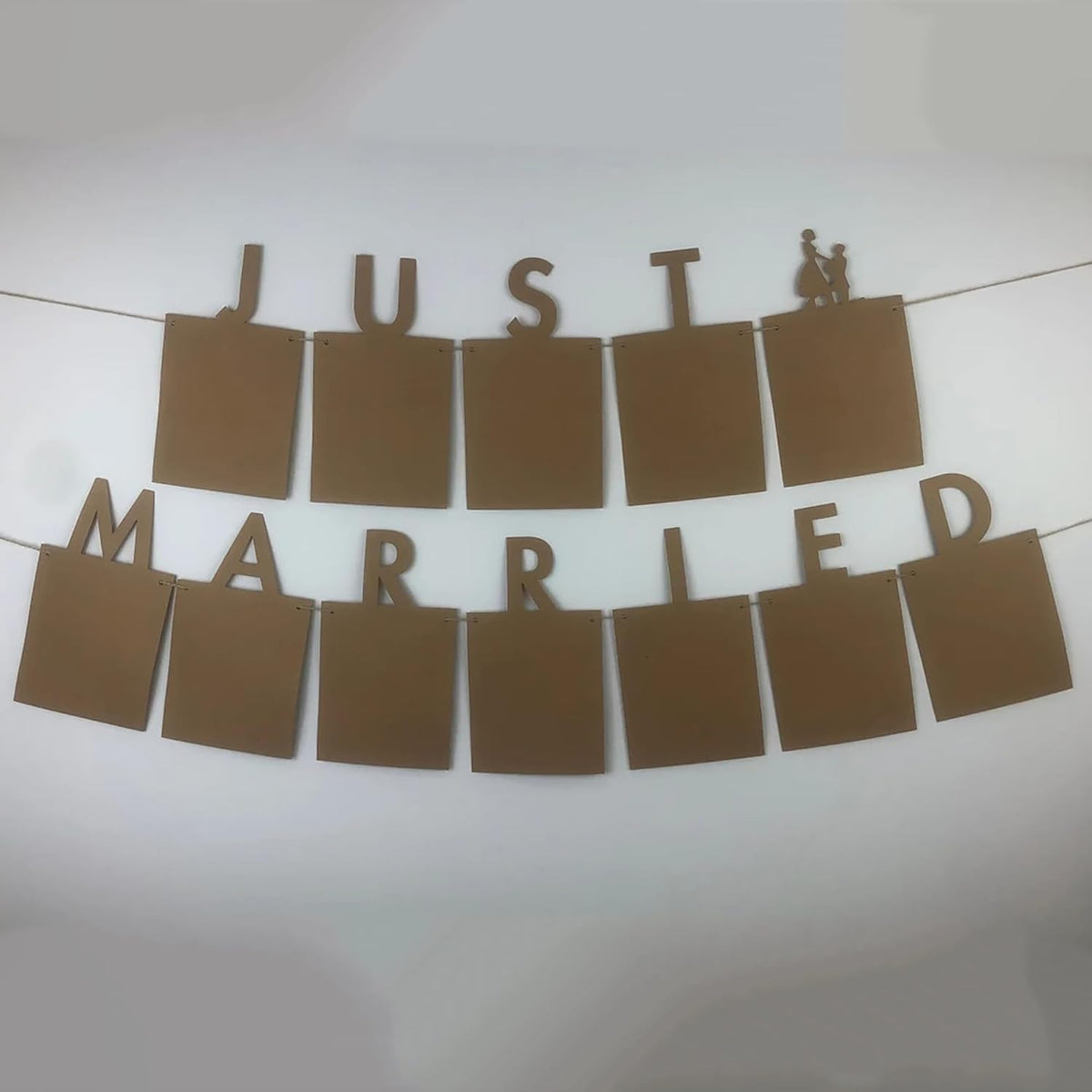 Decorative banner with 'Just Married' text on a white background
