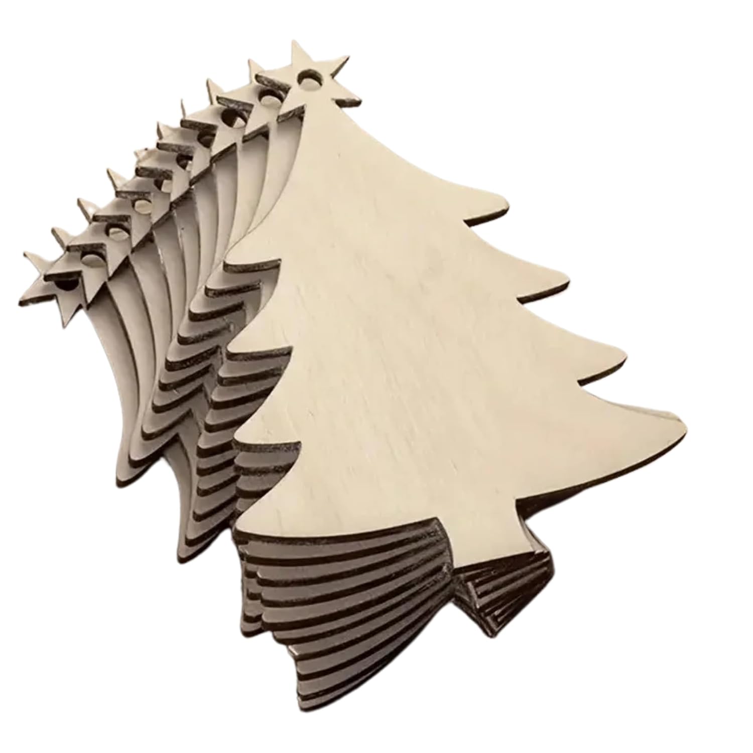 Stack of wooden Christmas tree and star decorations on a white background
