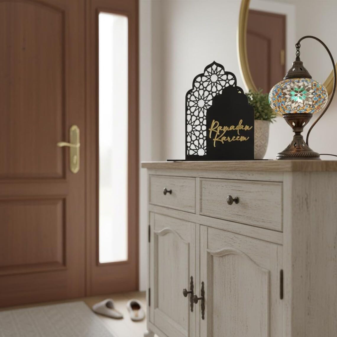 Decorative sign on a wooden cabinet with a lamp in a room.