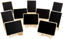 Set of small blackboards with gold stands on a white background