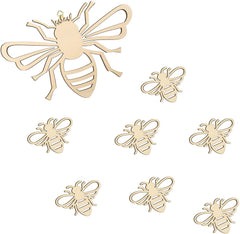 Set of gold bee-shaped decorations on a white background