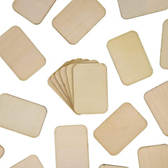 Beige square coasters scattered on a white background
