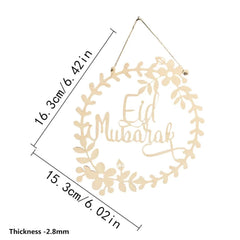 Decorative wall hanging with 'Eid Mubarak' text and leaf design, shown with measurements on a white background.