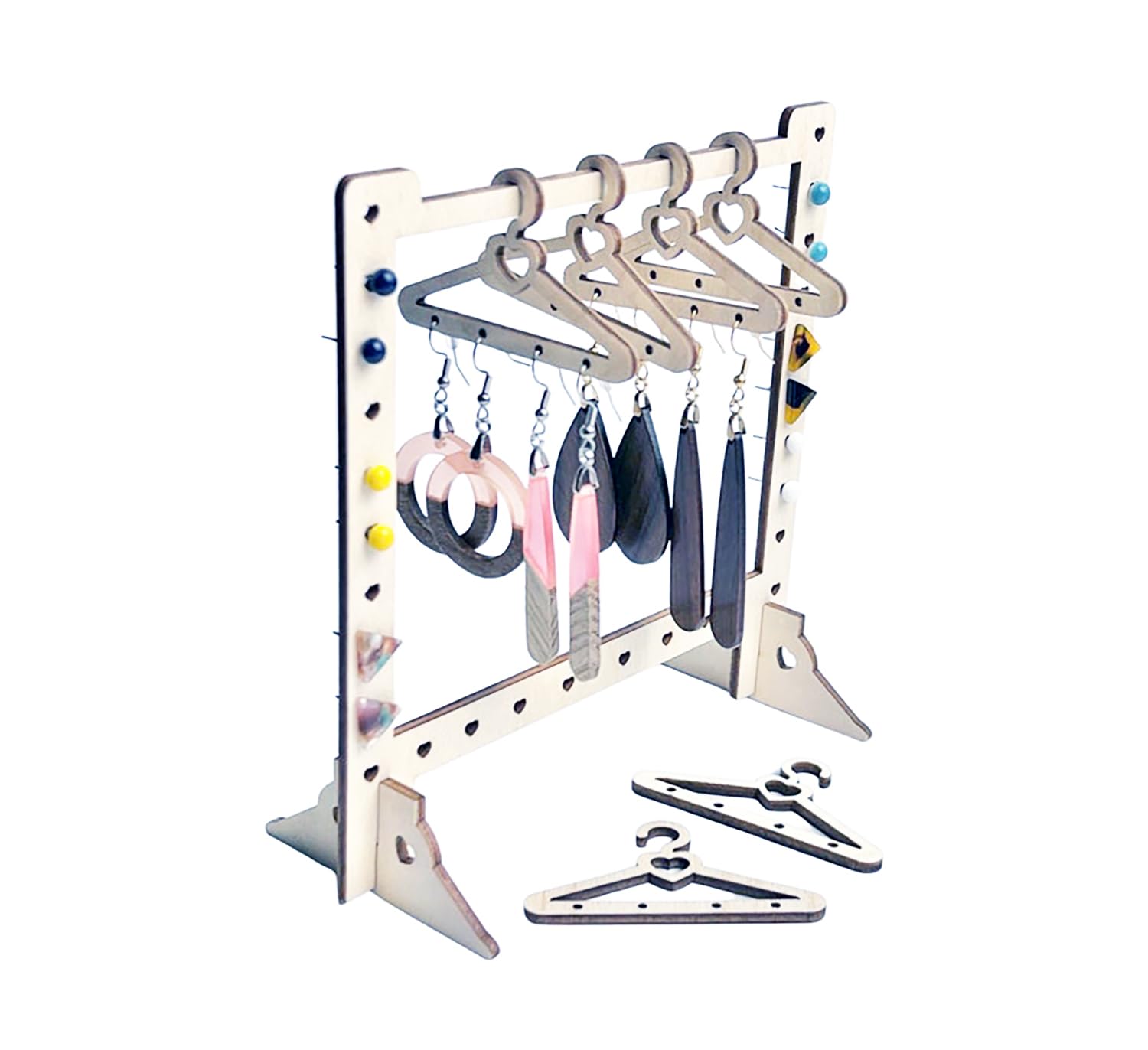 Jewelry display stand with hanging jewelry on a white background