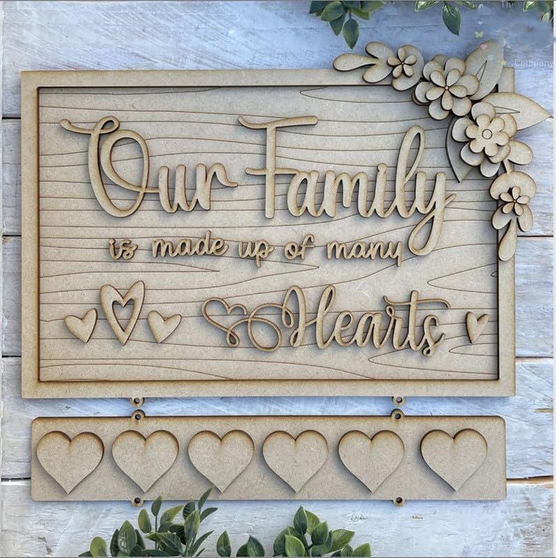 Decorative wooden sign with 'Our Family is made up of many Hearts' text and heart designs on a light background.
