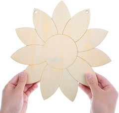 Wooden flower-shaped cutting board held by hands against a white background