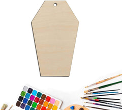 Wooden pentagon-shaped board with paintbrushes and watercolor set on a white background
