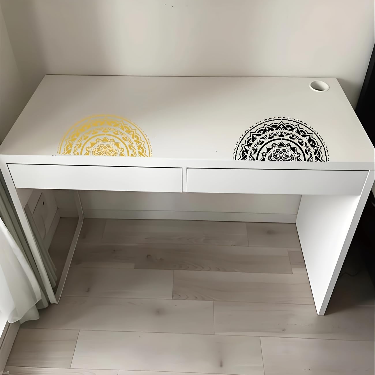 White desk with decorative cutouts on a wooden floor