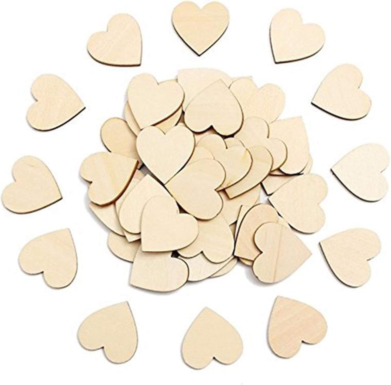 Pile of wooden heart shapes on a white background