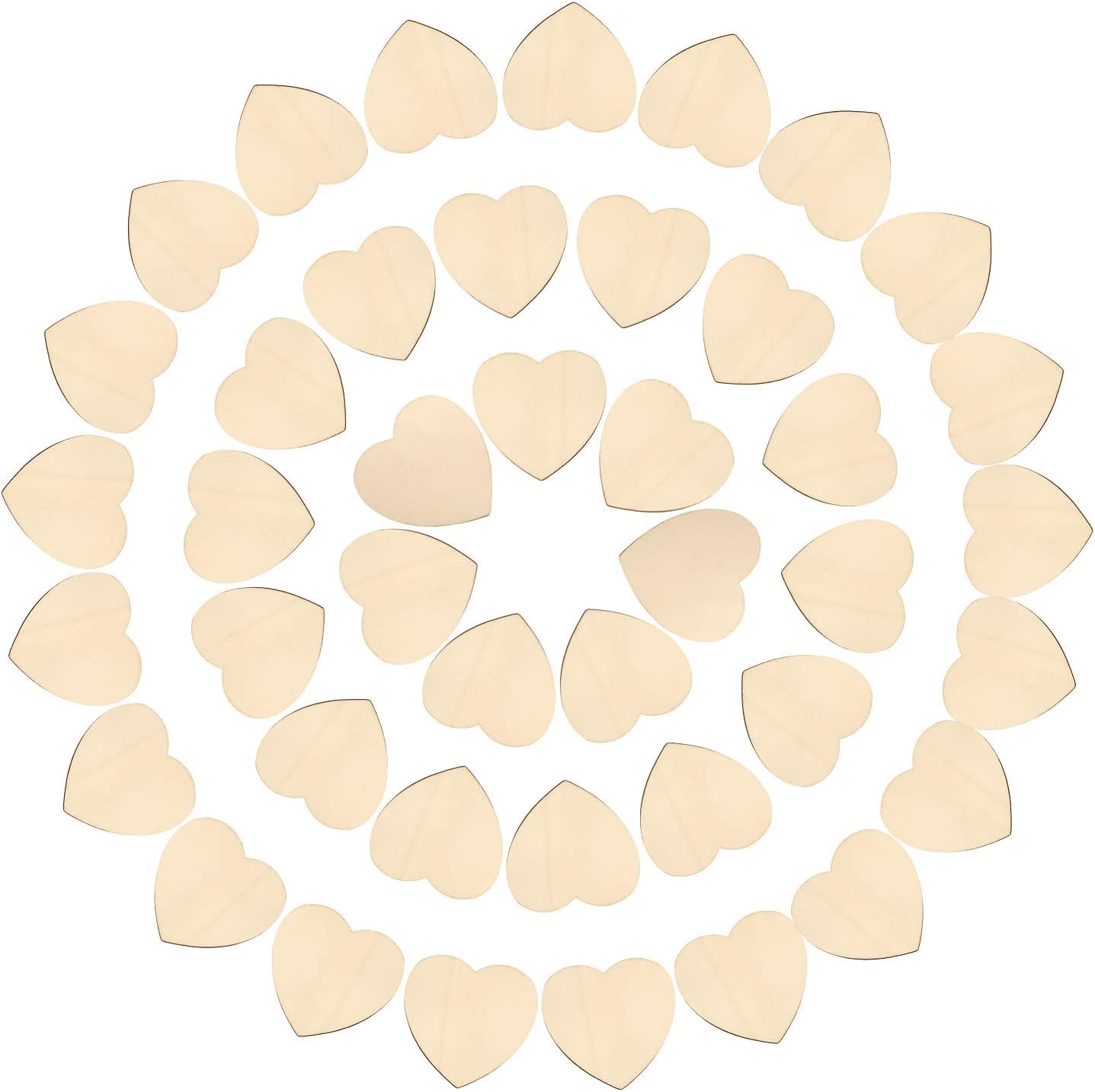 Collection of wooden heart shapes on a white background