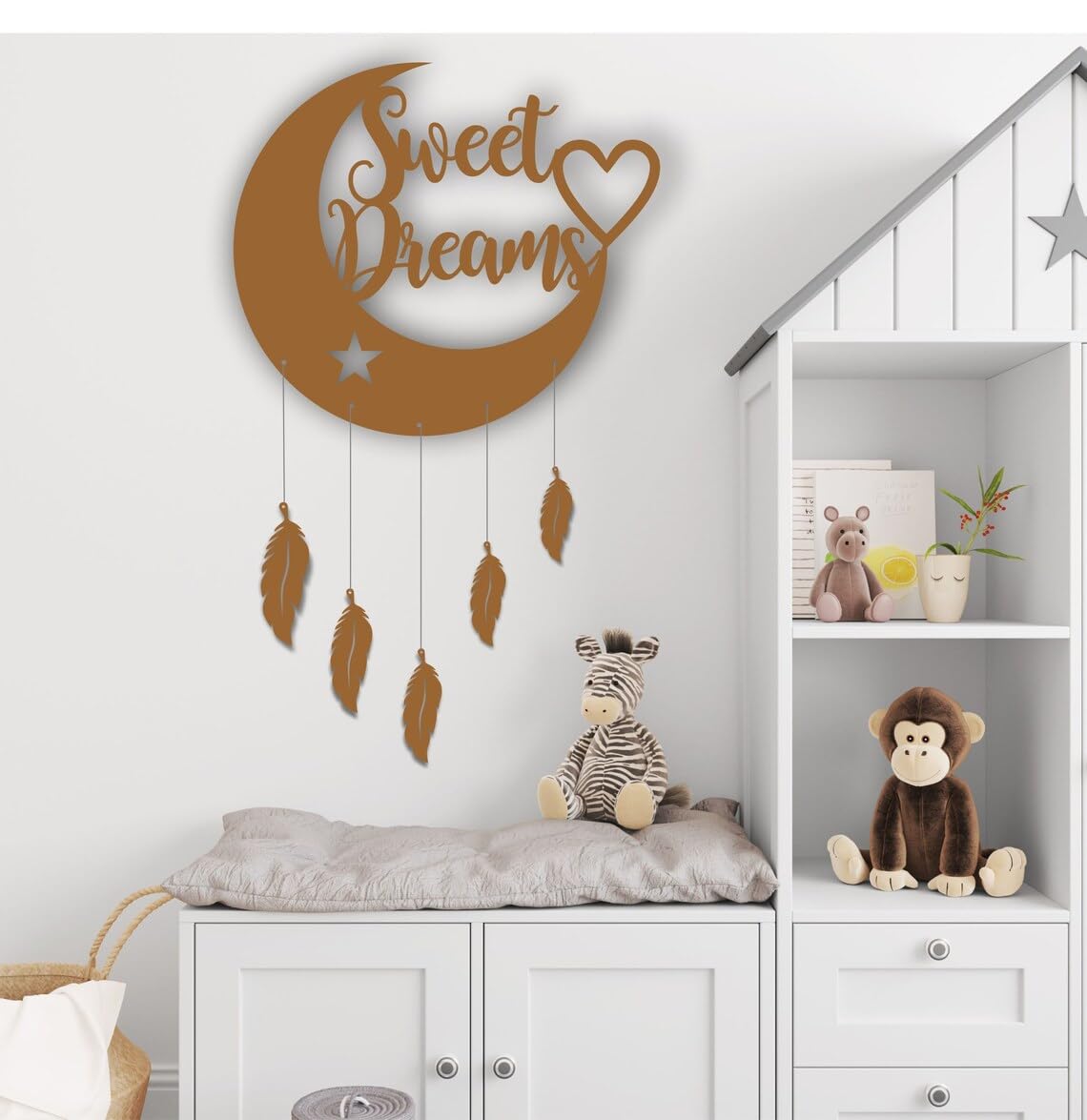 Decorative wall hanging with 'Sweet Dreams' text in a nursery setting.
