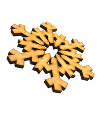Snowflake-shaped cookies with black borders on a white background