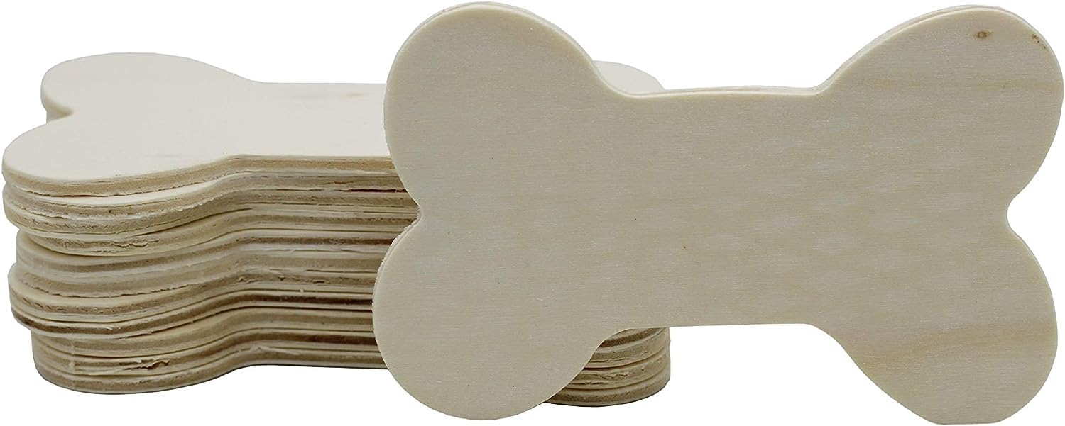 Stack of bone-shaped wooden tags on a white background
