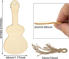 Wooden guitar-shaped ornament with measurements and tassel on a white background