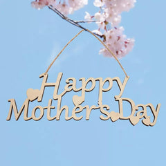 Wooden 'Happy Mother's Day' sign with cherry blossoms against a blue sky