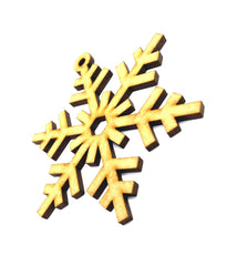 Gold snowflake ornament on a white background