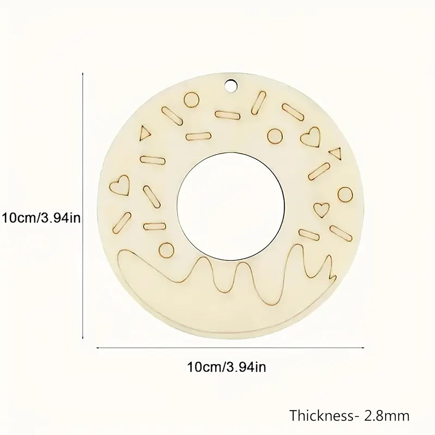Wooden circular cutout with decorative patterns and measurements on a white background
