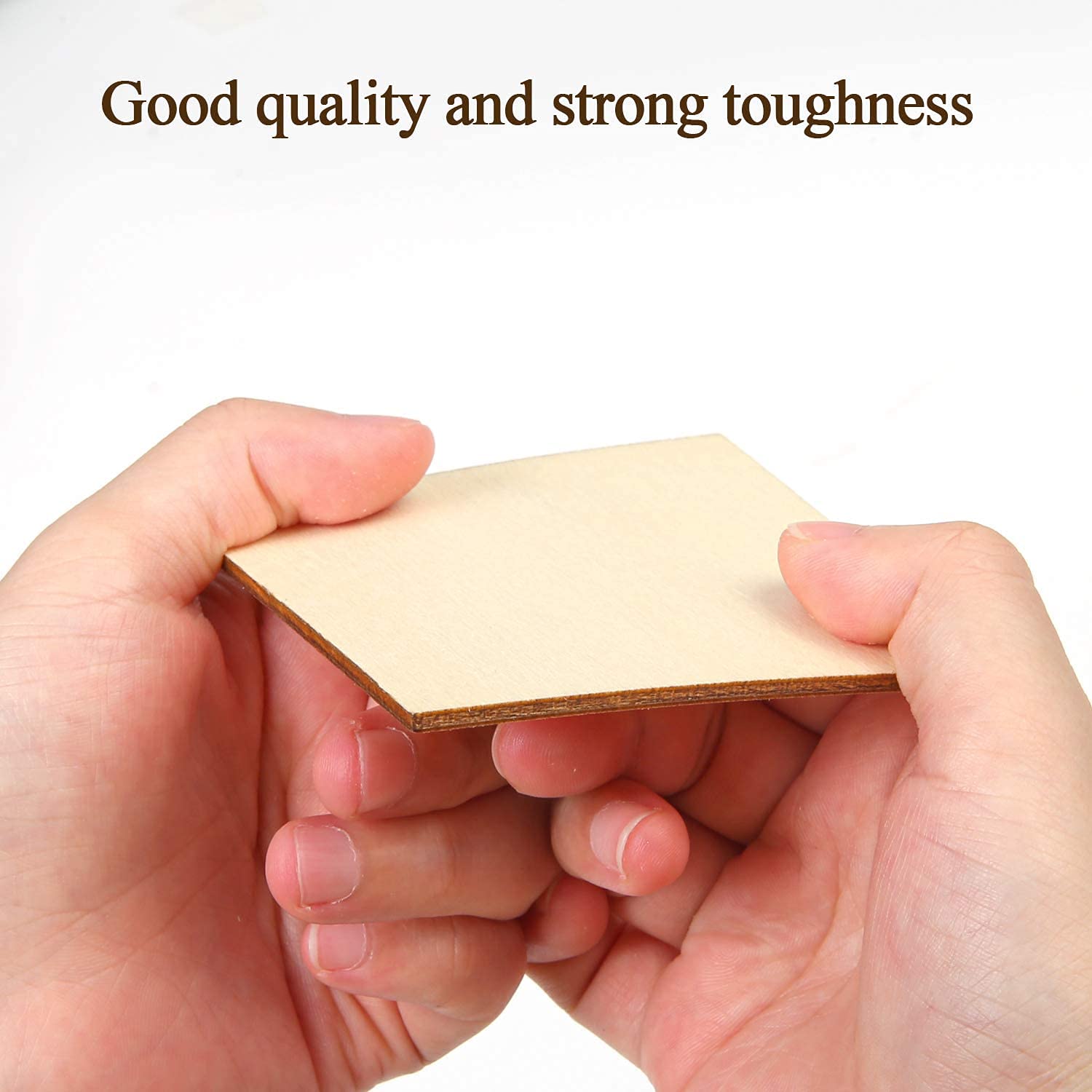Hands holding a piece of cardboard with text 'Good quality and strong toughness' on a white background