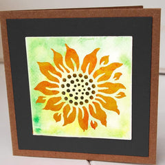 Card with a sunflower design on a green and yellow watercolor background