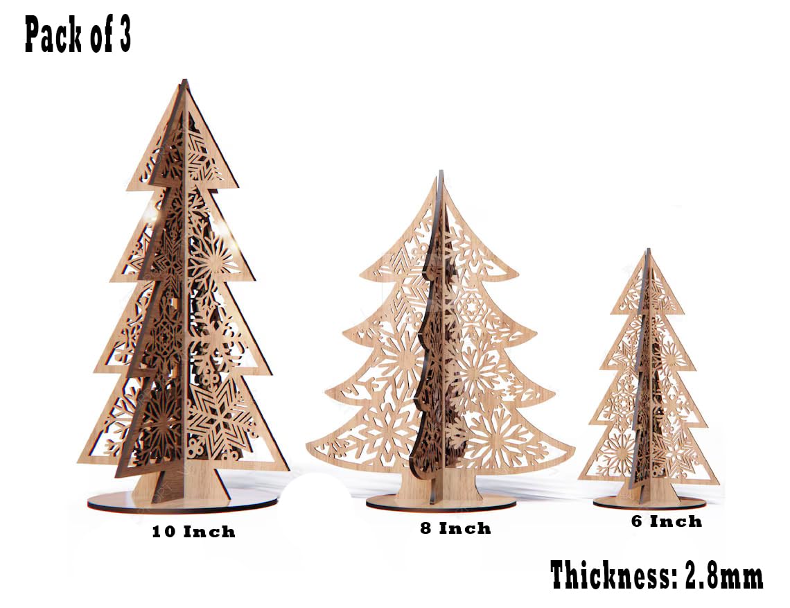 Three laser-cut wooden Christmas trees of different sizes on a white background