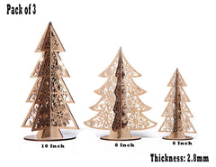 Three laser-cut wooden Christmas trees of different sizes on a white background