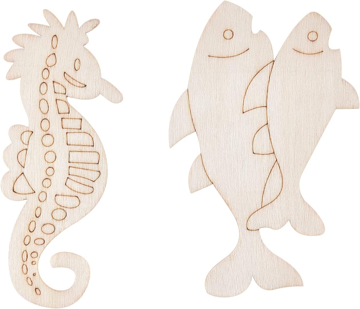 Wooden cutouts of a seahorse and two fish on a white background