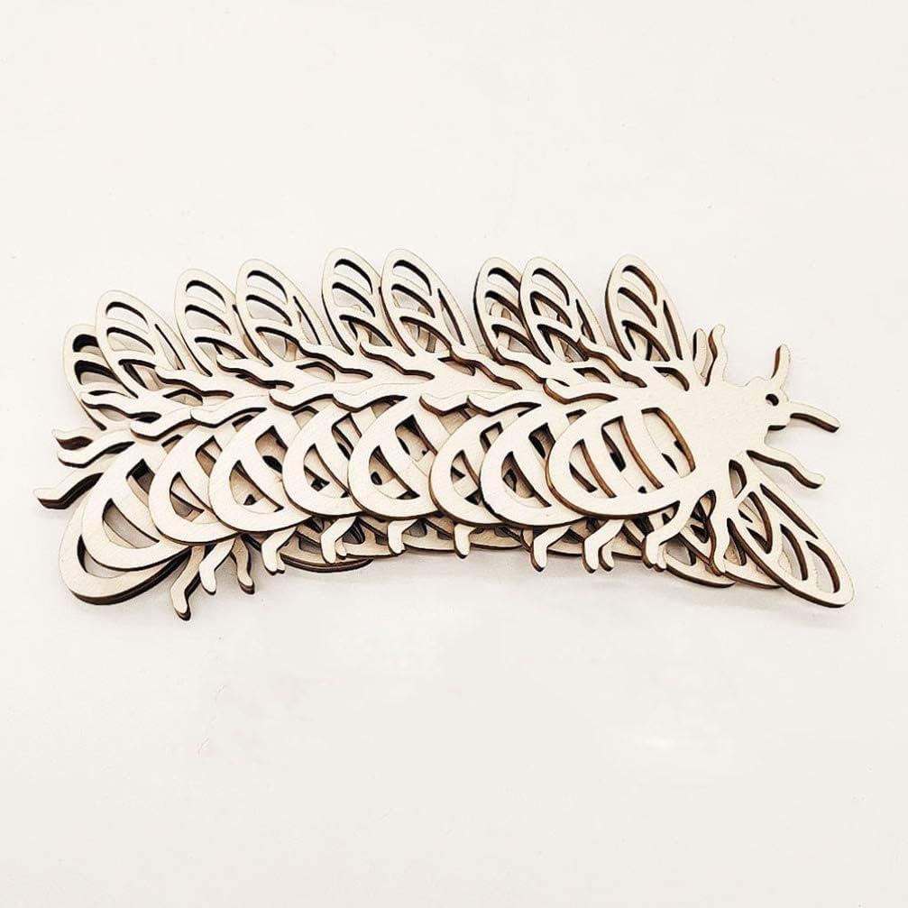 Stack of wooden feather-shaped cutouts on a white background