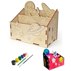Wooden toy box with space-themed design, paint set, and finished painted version on a white background