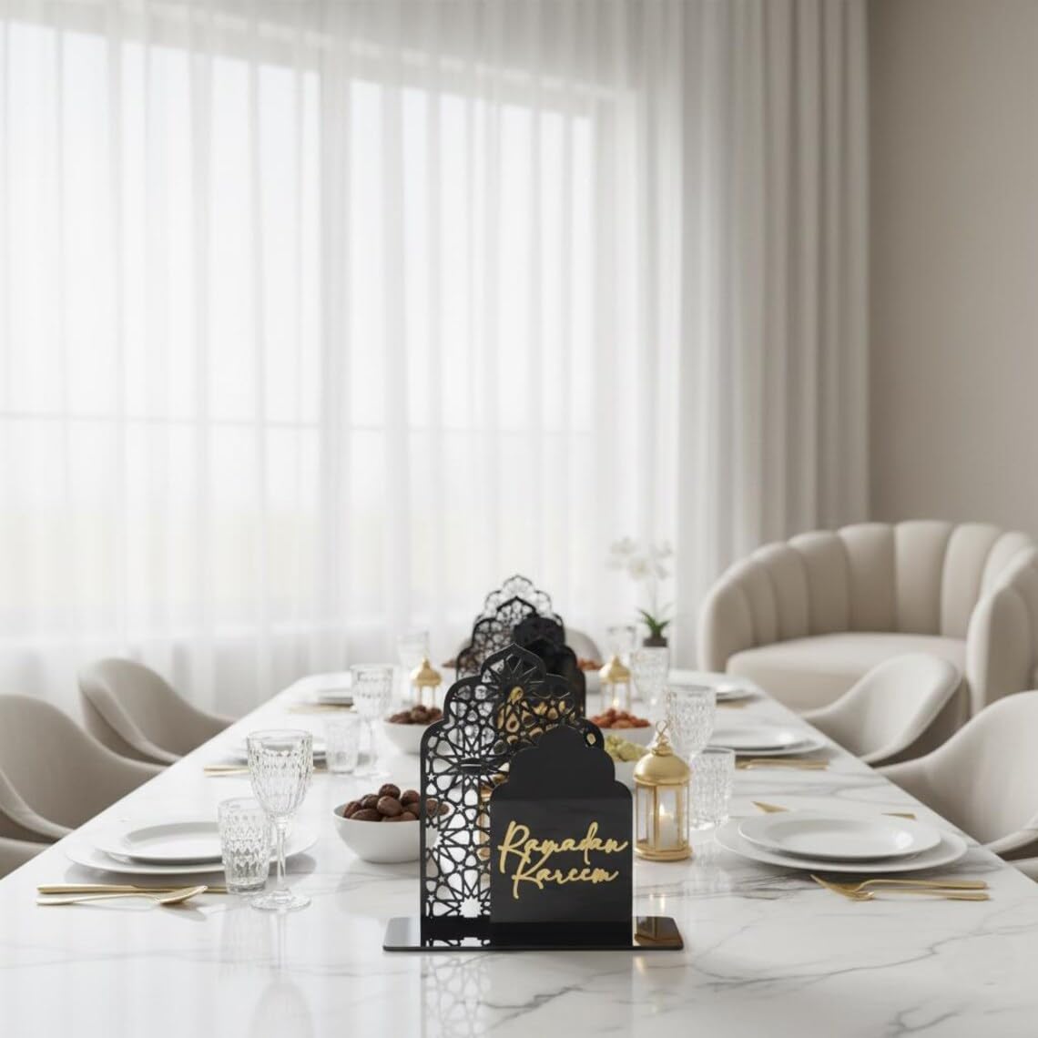 Elegant dining table setting with Ramadan Kareem decoration in a modern room.