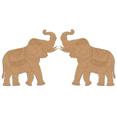Two decorative cardboard elephants with intricate patterns on a white background