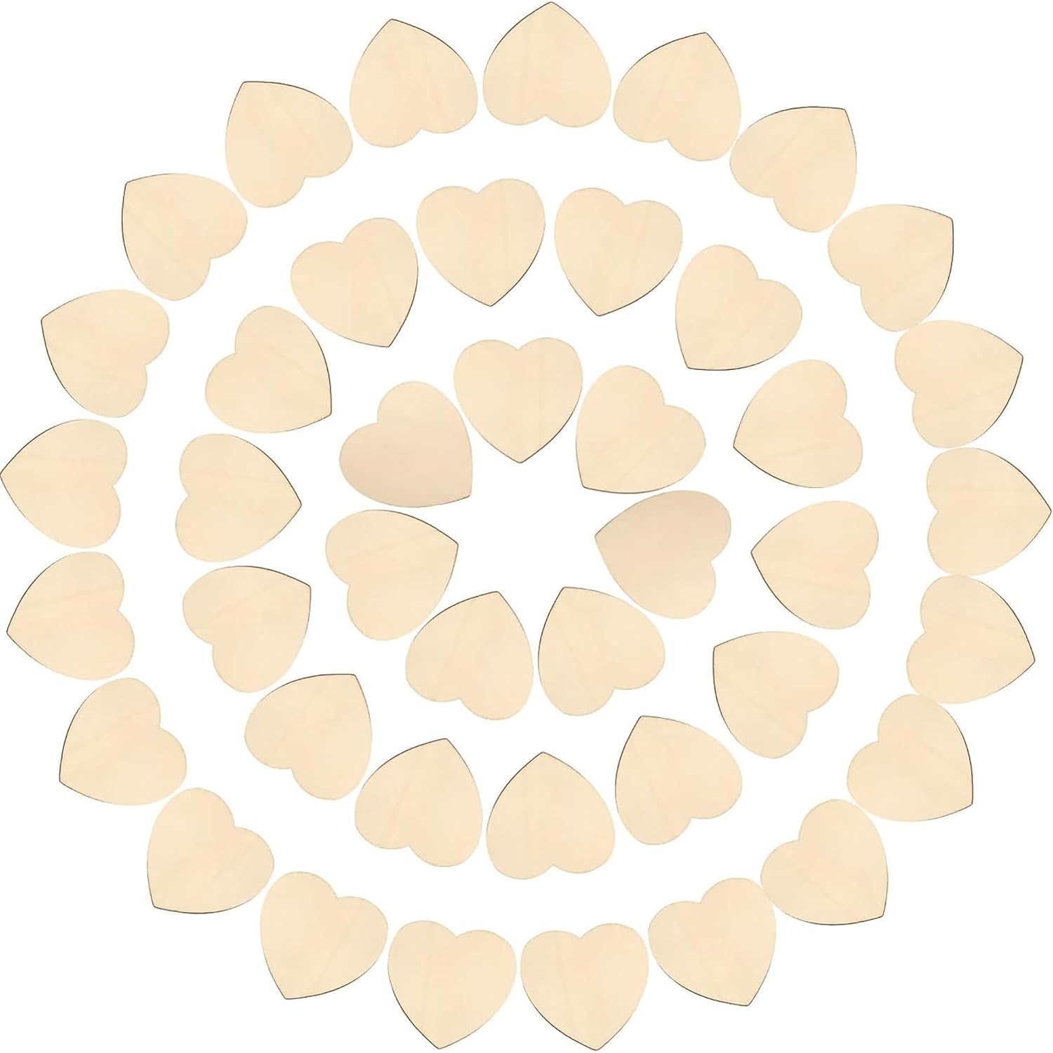 Collection of wooden heart shapes on a white background
