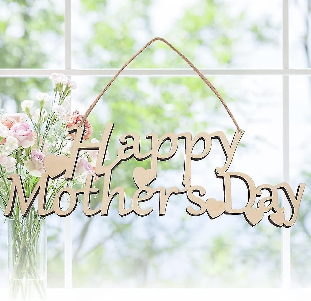 Wooden 'Happy Mother's Day' sign with flowers against a blurred green background