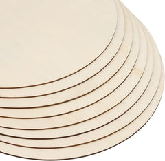 Set of round wooden cutouts with concentric circles on a white background